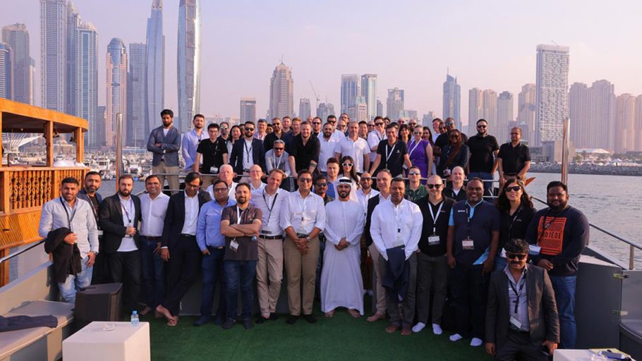 A group photo against the picturesque landscape