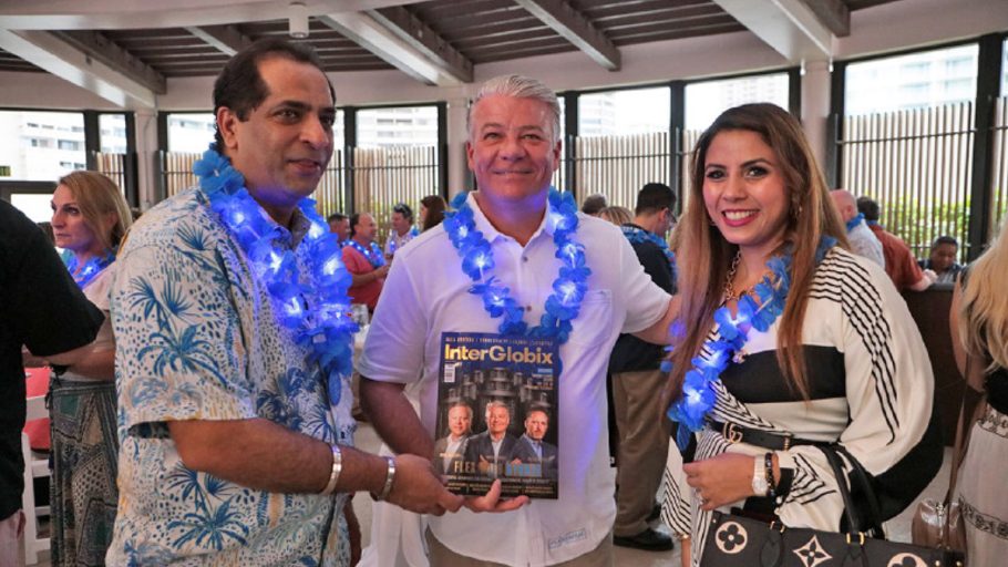 Chris Downie, Vinay Nagpal, and Jasmine Bedi with issue 9 of InterGlobix Magazine